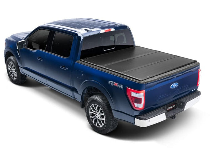 UnderCover 17-22 Ford Super Duty 6.75ft Triad Bed Cover